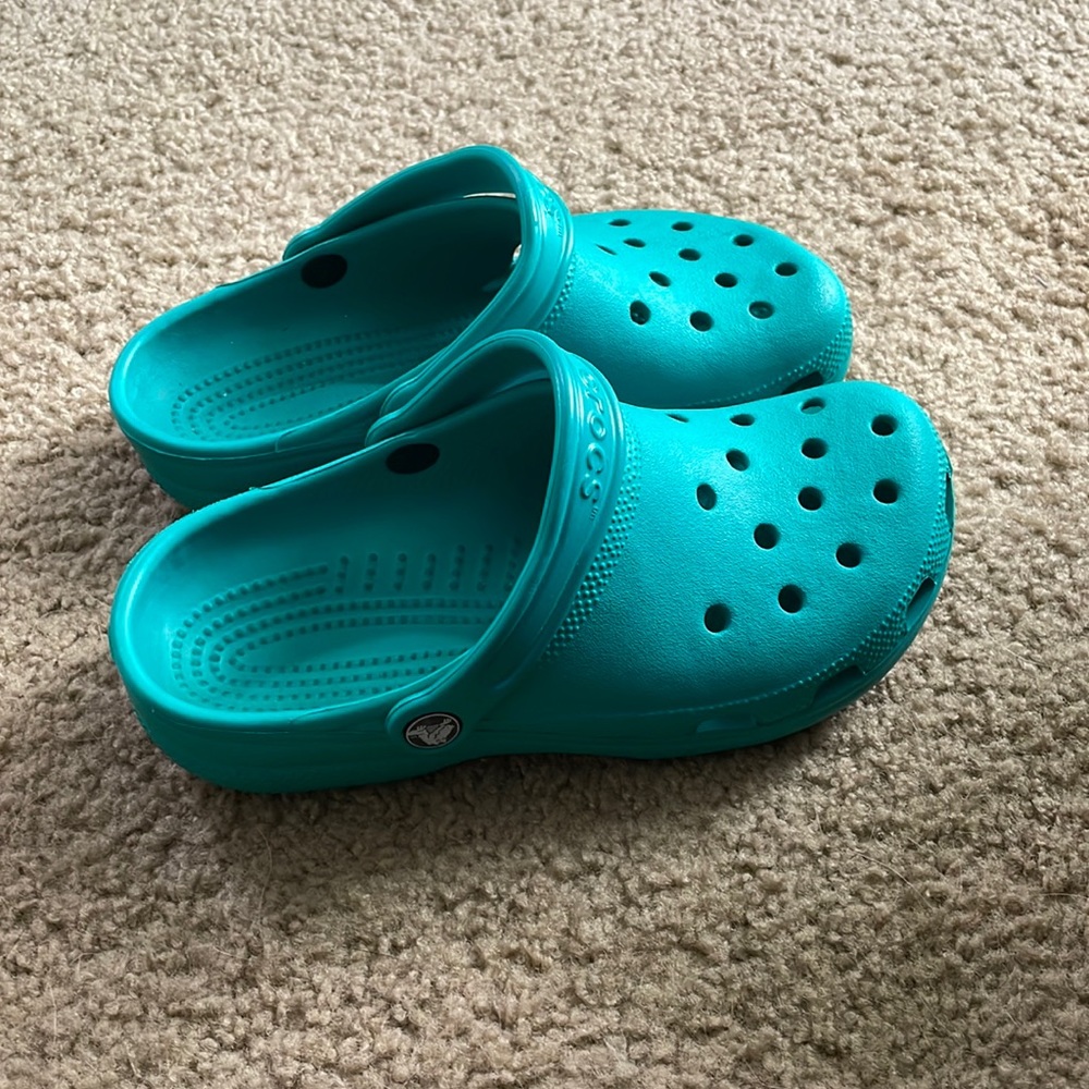 Teal Crocs like new